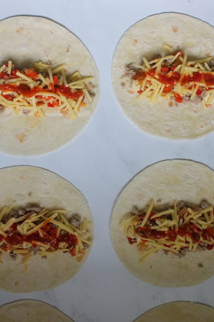 Breakfast Burritos on a white marble background
