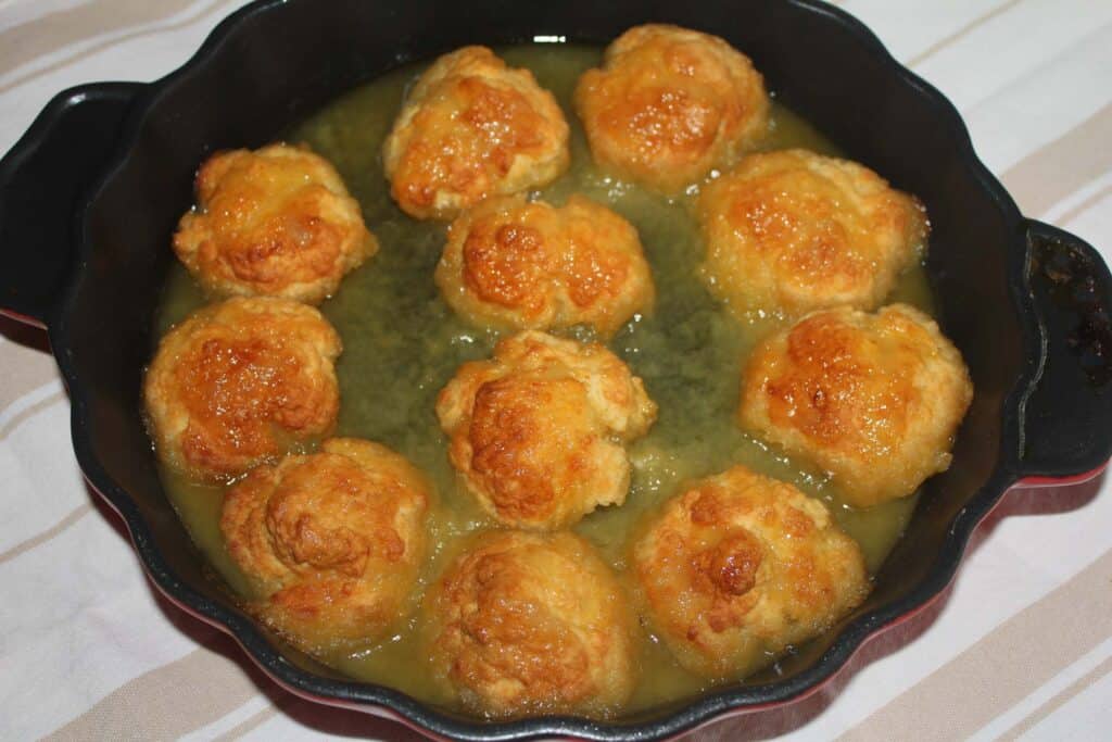 Golden Syrup Dumplings in a black baking dish
