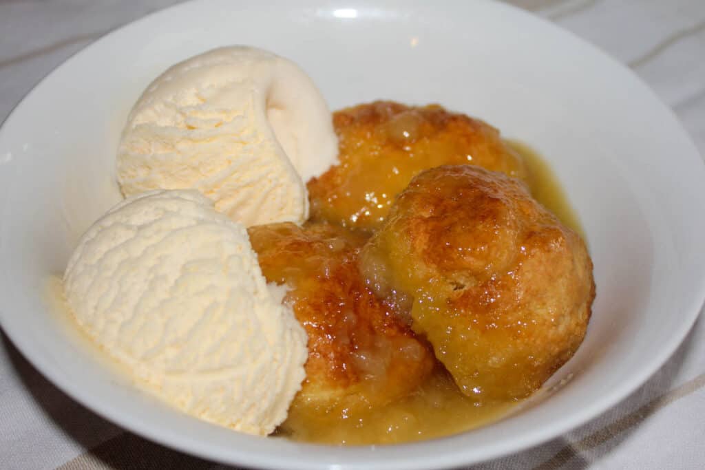 Golden Syrup Dumplings in a white bowl