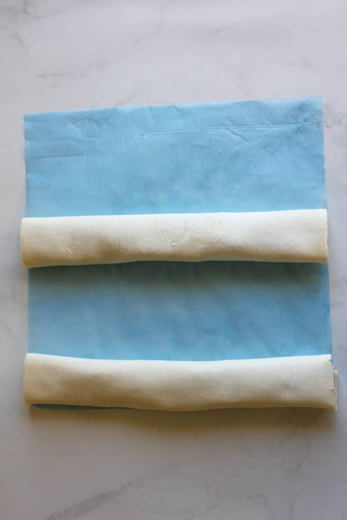 Puff pastry rolled over, onto itself.