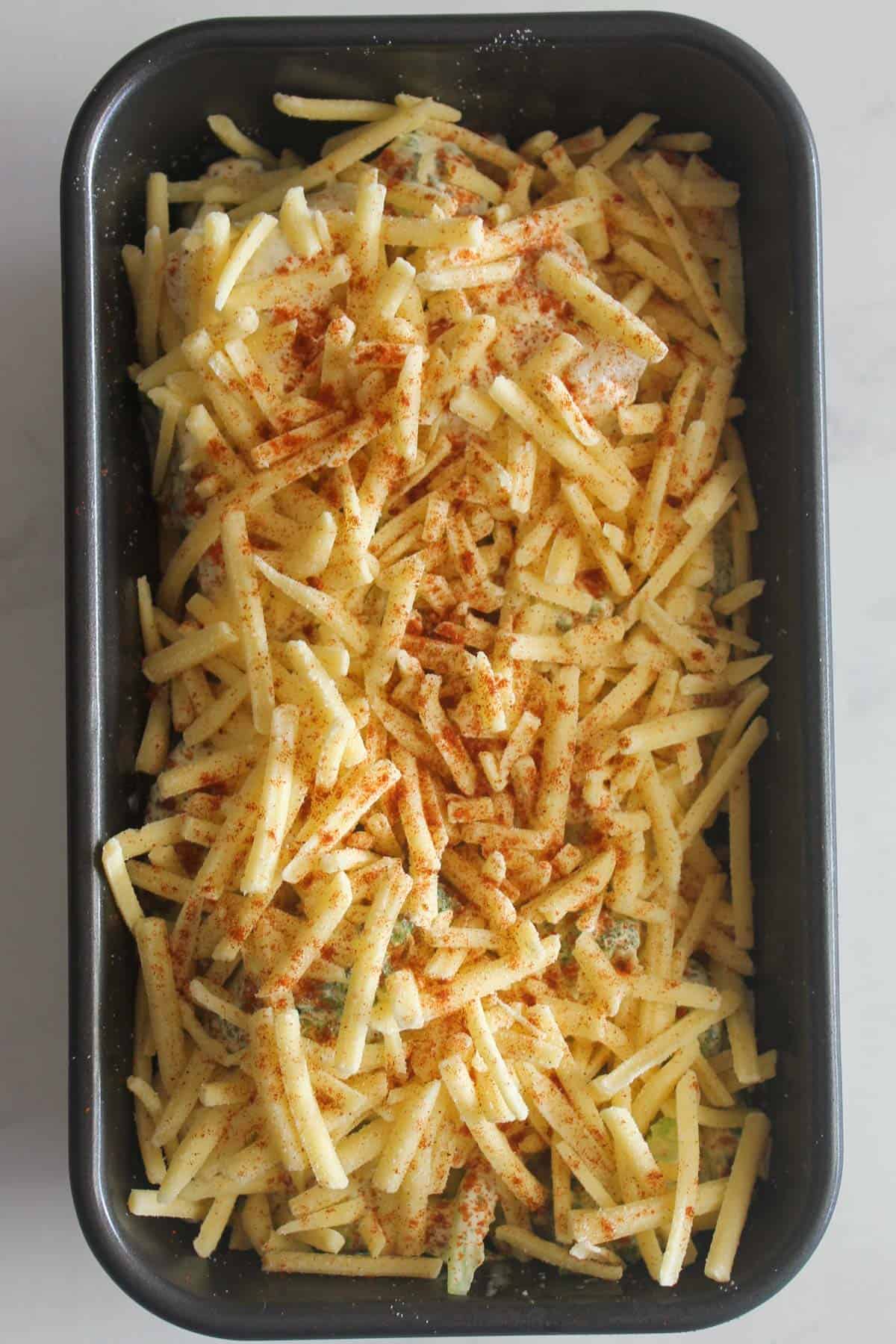 Shredded cheese over the top of vegetables raw