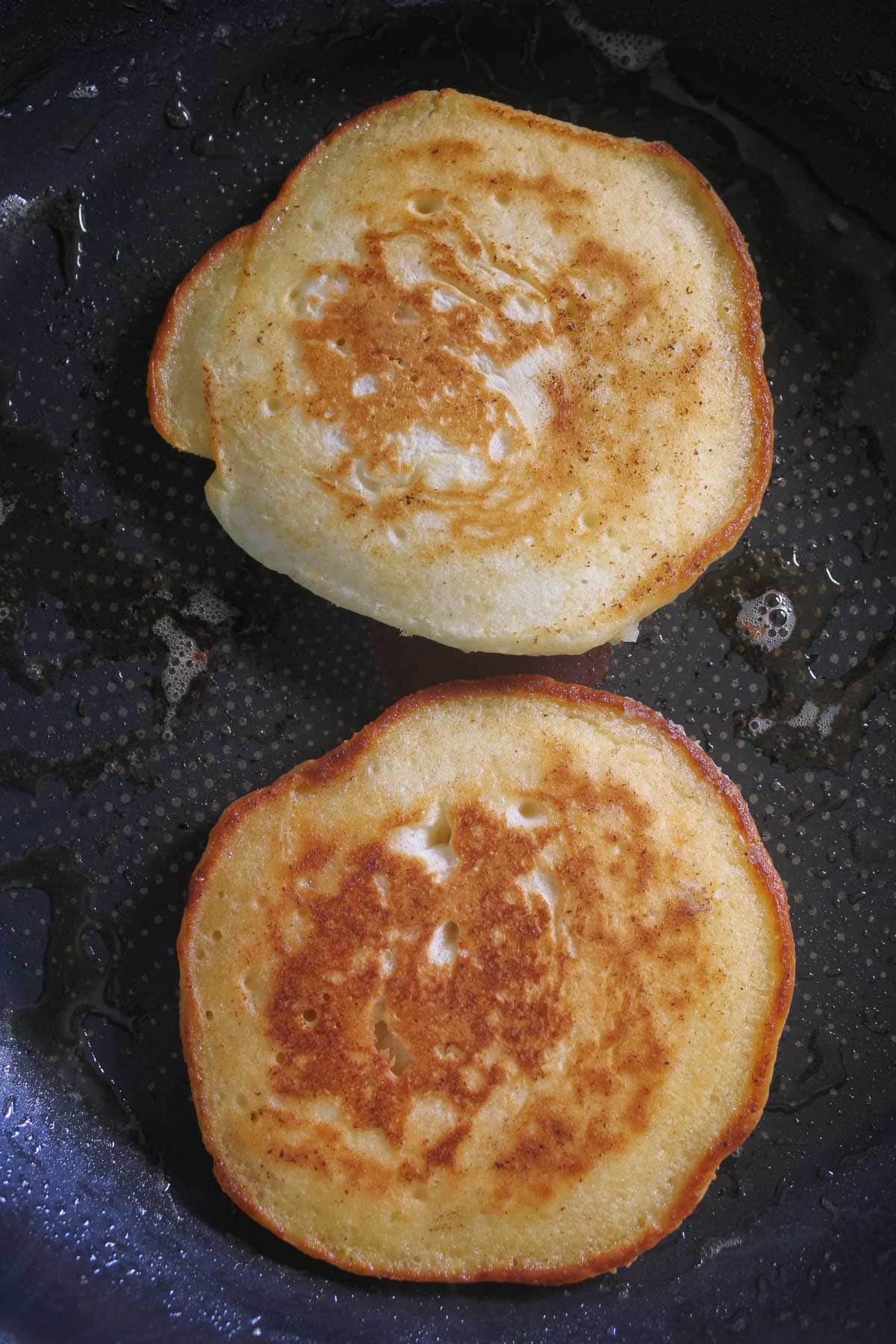 Pancake cooked in a frypan with butter