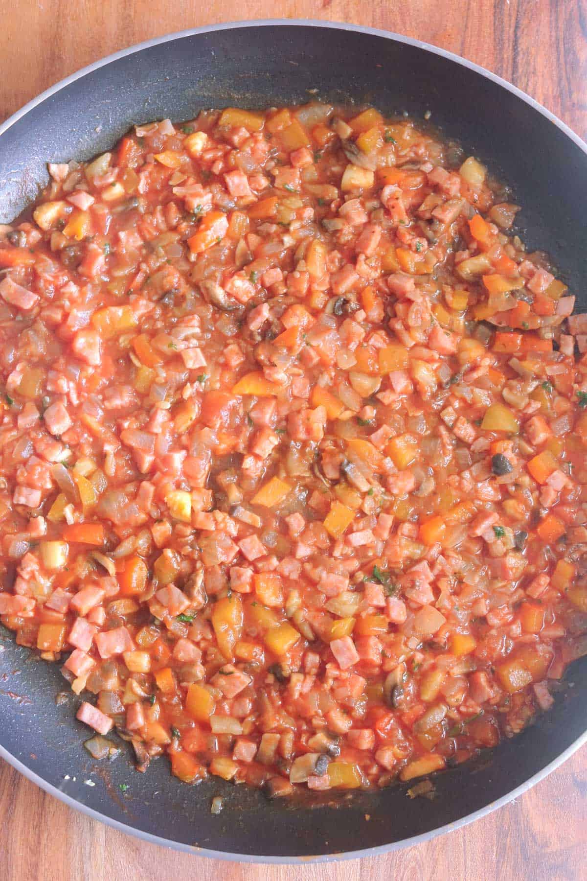 Zucchini boats filling cooked and in frypan