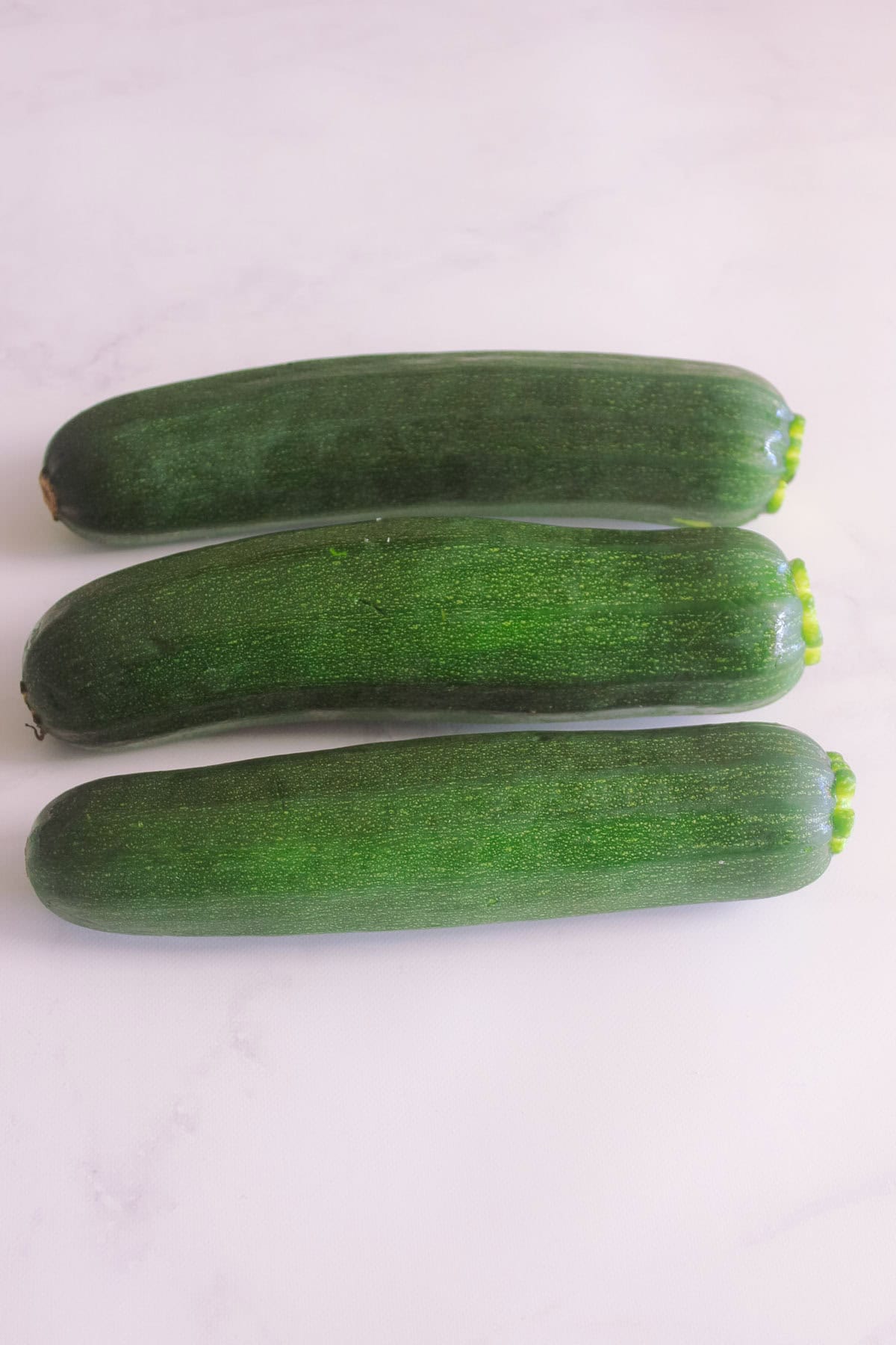 Zucchini on a white background